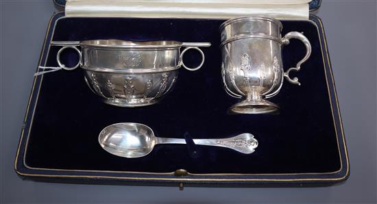 A cased matched George V silver three piece christening set, Goldsmiths & Silversmiths Co Ltd, Sheffield, 1918/9 and London, 1929.